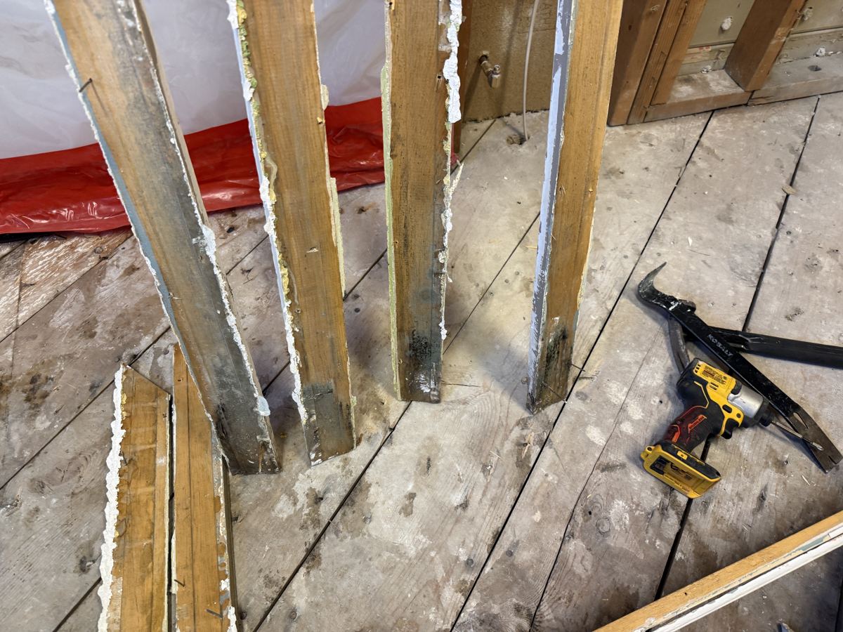 Alamosa project photo 3: Framing exposed during removal, inside containment.