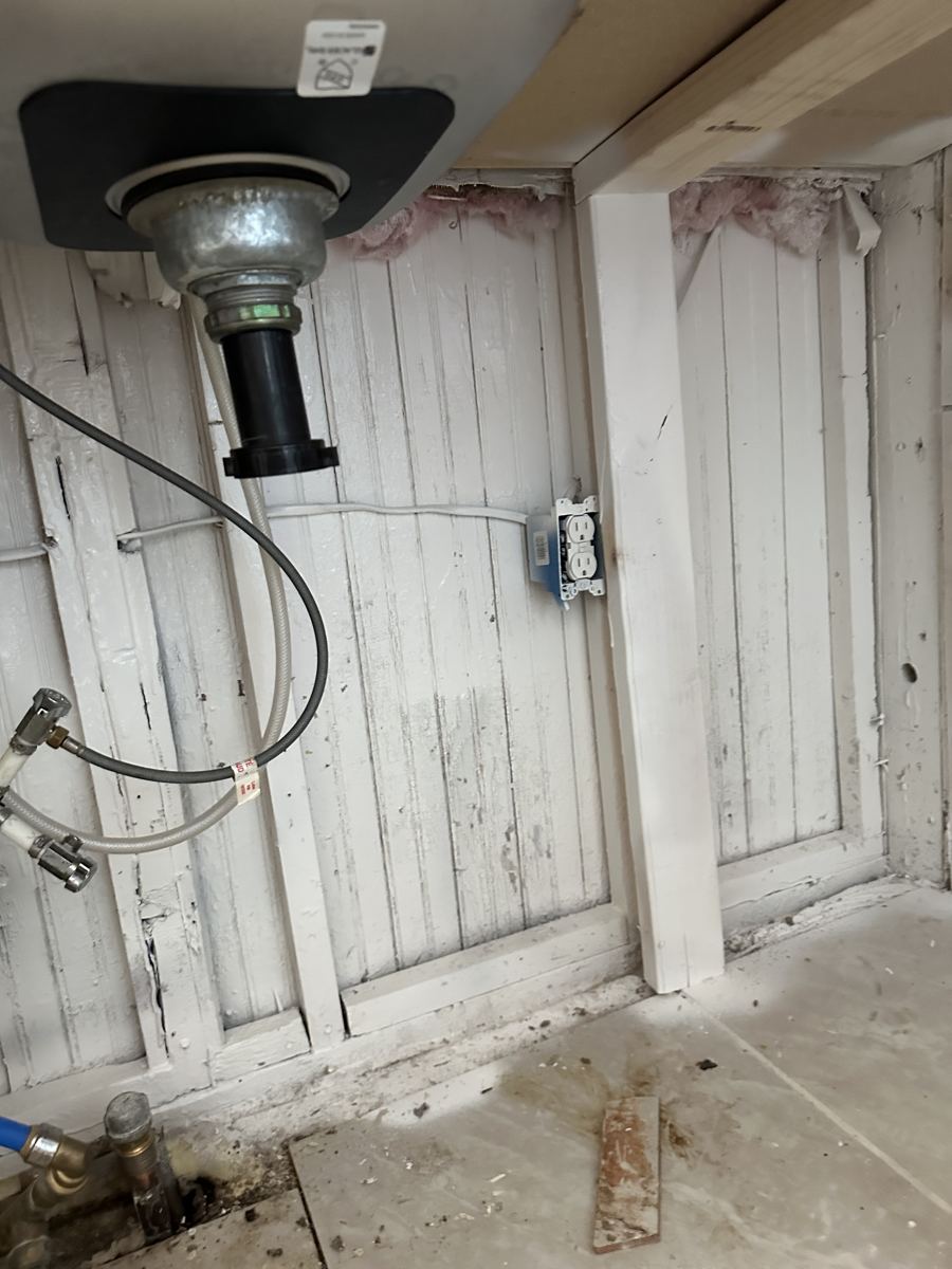 Pueblo project photo 7: Tear-out down to the studs behind the sink.